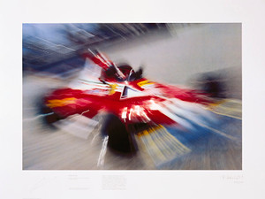 Limited Edition art print of 400.  This photographic art print features Ferrari's 1975 and 1977 F1 World Champion, Niki Lauda. It is numbered and signed by the legendary F1 photographer, Rainer Schlegelmilch.