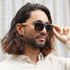 This classic men's style features a rectangle frame for an effortless masculine look.  The black non-slip frame is fitted with UV400 polarised lenses and finished with walnut wood arms.  Designed for many face shapes.
