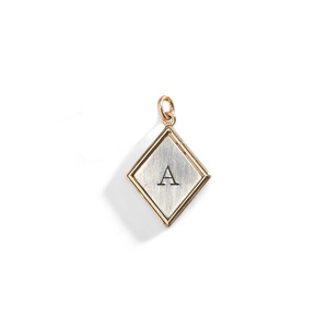 Red Queen Diamond Shaped Initial Charm in Sterling Silver. Red Queen Diamond Shaped Initial Charm in Sterling Silver.
