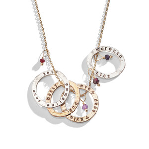 Double-Sided Eternity Ring Necklace with multiple name charms in bronze and sterling silver. Double-Sided Eternity Ring Necklace with multiple name charms in bronze and sterling silver.