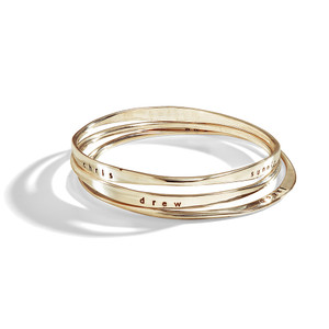 Stack of Gold Cosette, Ondine and Epione Bracelets in Yellow Gold. Stack of Gold Cosette, Ondine and Epione Bracelets in Yellow Gold.