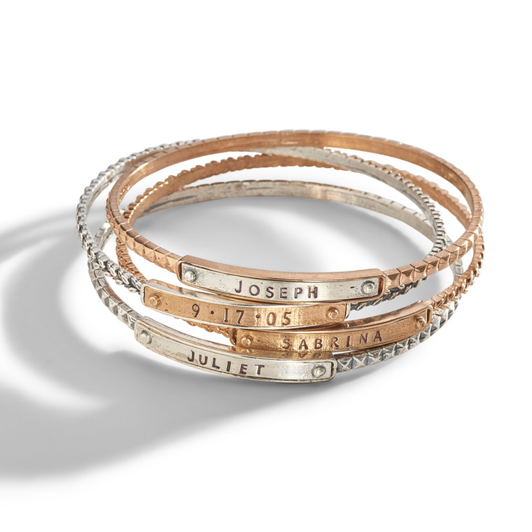 Ina Personalized Stacking Bangle Bracelet in sterling silver and bronze.