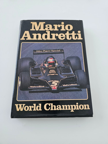 Mario Andretti World Champion (Signed by Mario Andretti )