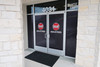 Perforated window film for business