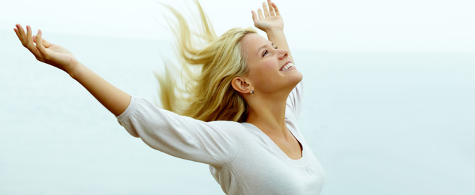 happy-woman-with-arms-outstretched1.jpg