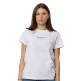 Back view of the white Carlton Women's Signature Tee worn by a model.