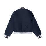 Back view of the navy Carlton Women's Monogram Bomber Jacket worn by a model.