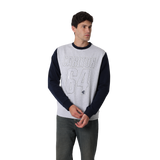 Back view of the Carlton Adults Varsity Oversized Crew sweatshirt worn by a model.