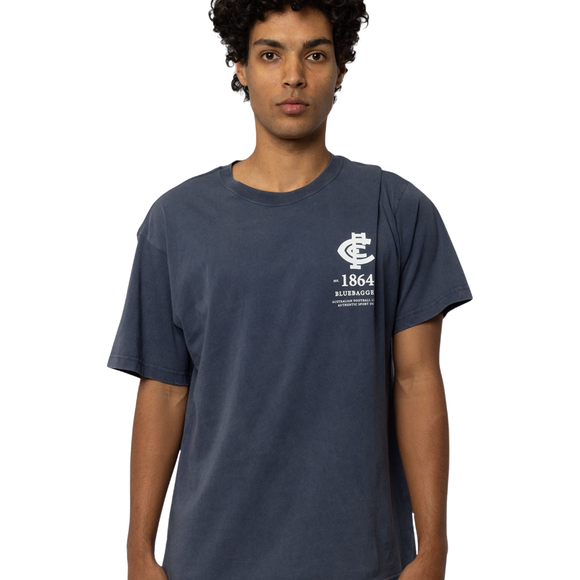 Close-up of the hem tag on the Carlton Adult Acid Wash Tee.