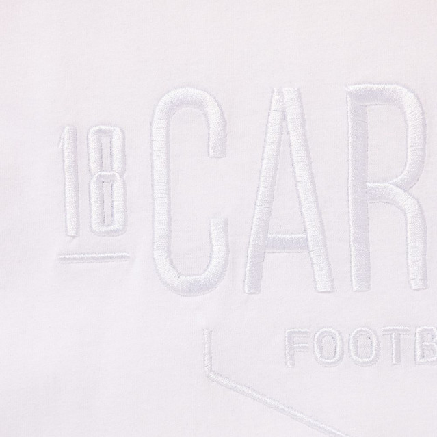 Close-up of the embossed detail on the Carlton 1864 Men's White Tee.