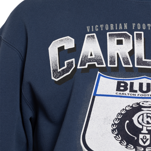 Close-up of the shield graphic on the Mitchell & Ness Shield Crew.