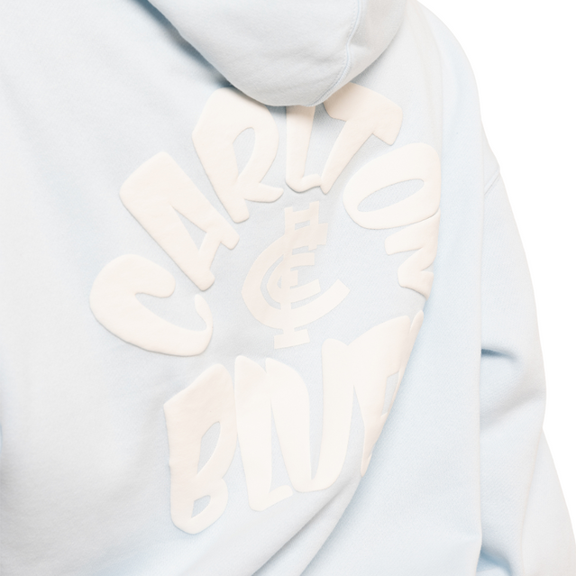 Close-up of the puff print logo on the Womens Powder Blue Puff Hood.