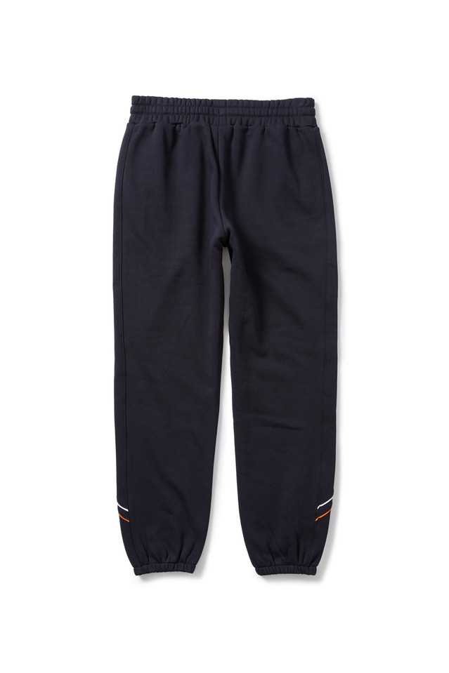 Front view of the 2025 Cotton On S10 Women's Track Pants for Carlton AFLW support.