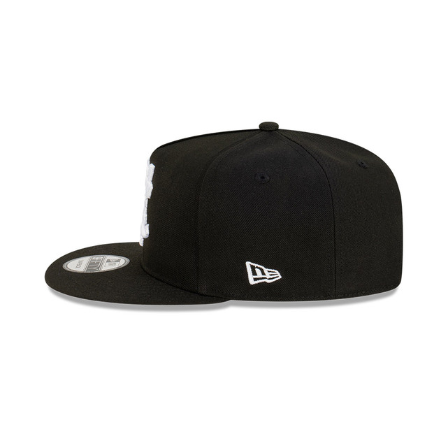 Left side view of the Carlton New Era Classic Black 9Fifty cap.