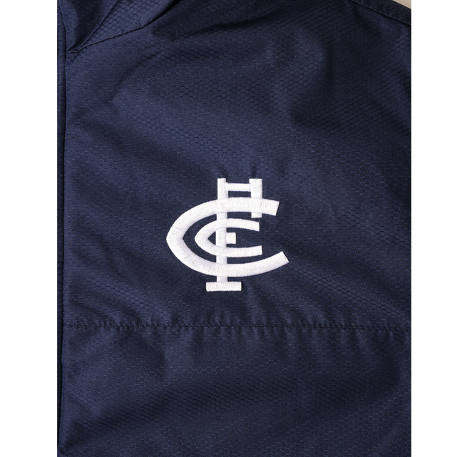 Close-up of the logo detail on the W24 Carlton Mens Stadium Jacket.