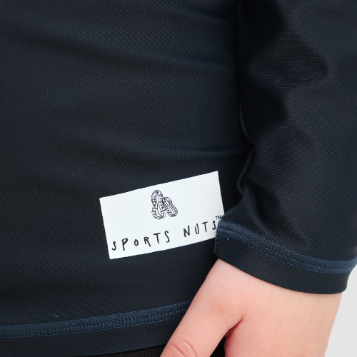 Lifestyle image of the Carlton Rash Top worn in water.