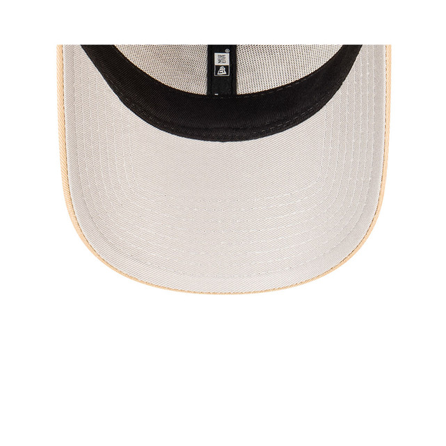 Close-up of the logo on the 2024 New Era 9Forty Camel cap.