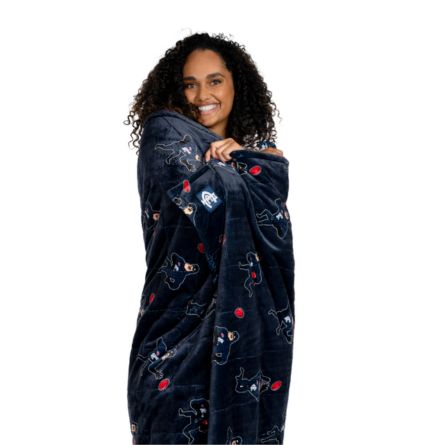 Lifestyle image of the Carlton Oodie Blanket being worn.