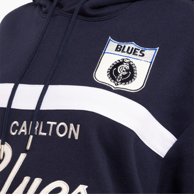 Lifestyle side shot of the Mitchell & Ness Head Coach Hood.