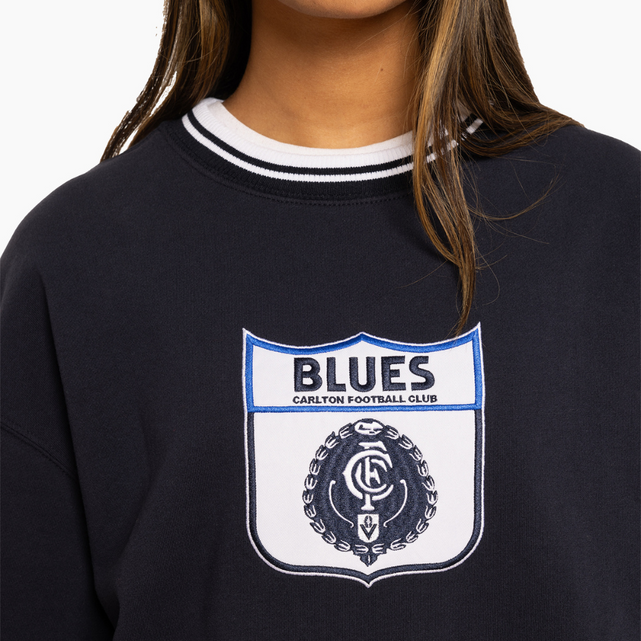 Close-up of the applique logo on the Mitchell & Ness Crew.