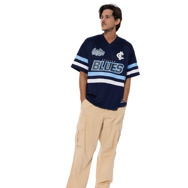 Side view of the Carlton Mens Mesh Jersey.