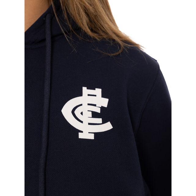 Close-up of the chest logo on the 2025 Womens Zip Core Hood.
