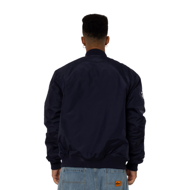 Lifestyle front shot of the '95 Nylon Bomber Jacket worn by a model.