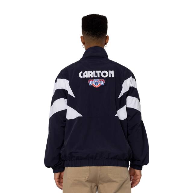 Lifestyle back shot of the '95 Spray Jacket worn by a model.