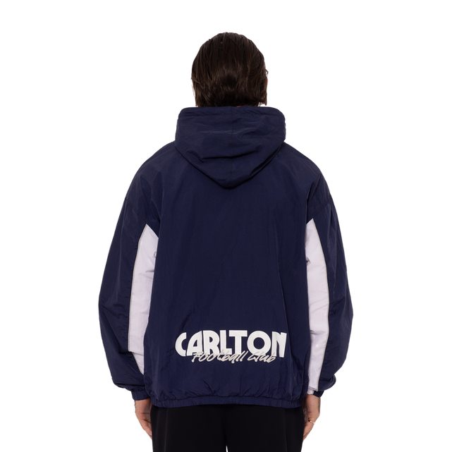 Close-up of the chest patches on the Men's Throwback Logo Spray Jacket.