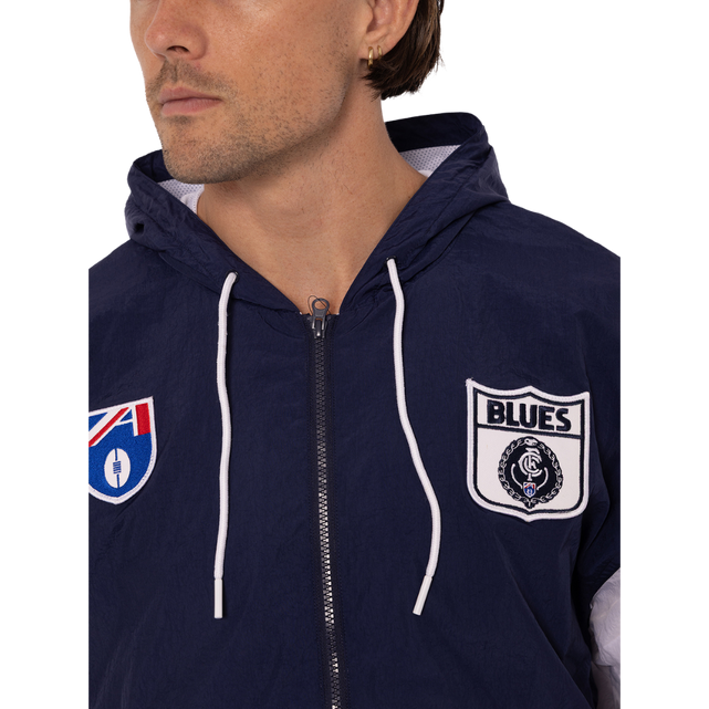 Close-up of the back logo on the Men's Throwback Logo Spray Jacket.