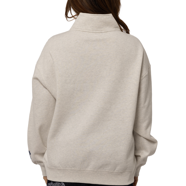 Close-up of the chest logo on the Women's Sports Box 1/4 Zip.