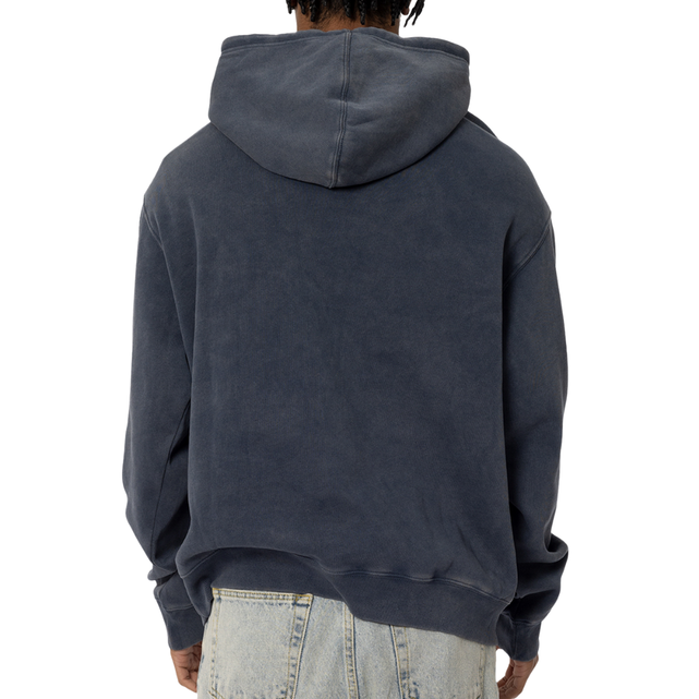 Close-up of the chest logo on the Carlton Adult Acid Wash Hoodie.