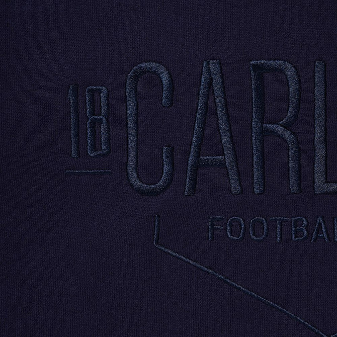 Close-up of the embossed detail on the Carlton 1864 Youth Crew.