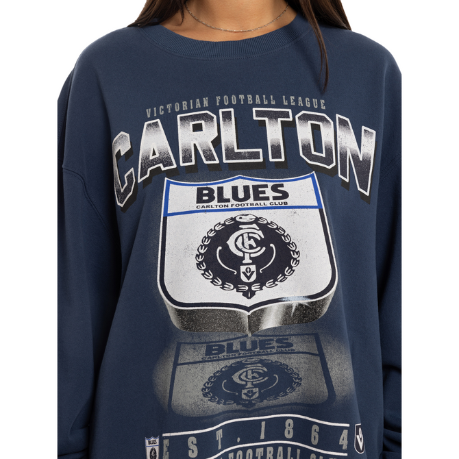 Side view of the Mitchell & Ness Carlton Shield Crew sweatshirt.