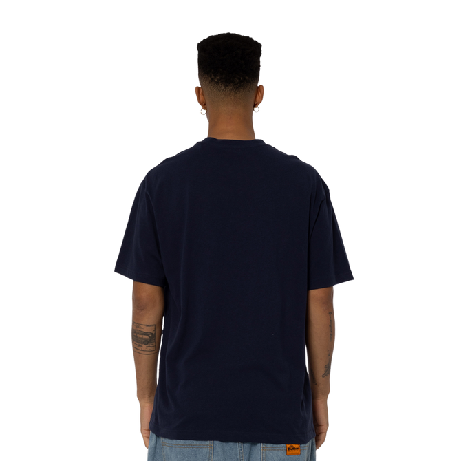 Lifestyle front shot of the '95 Premiership Team Tee worn by a model.
