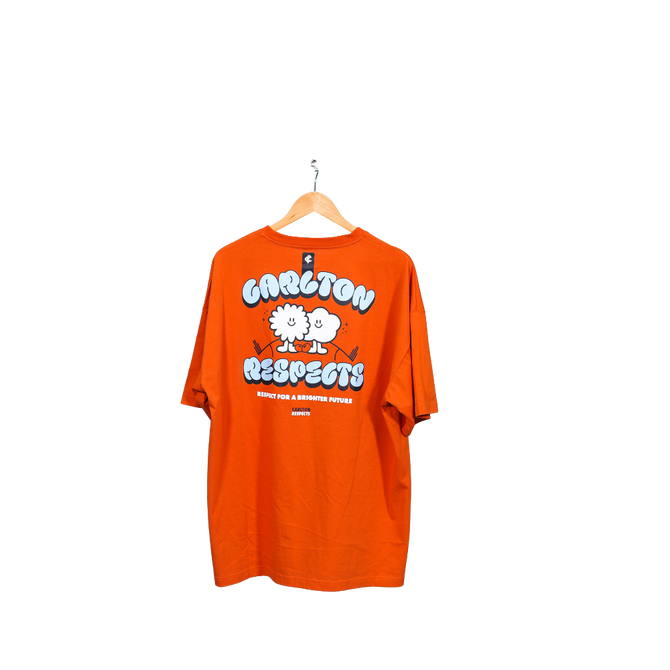 Close-up of the hem tag on the 2025 Youth Carlton Respects Tee.