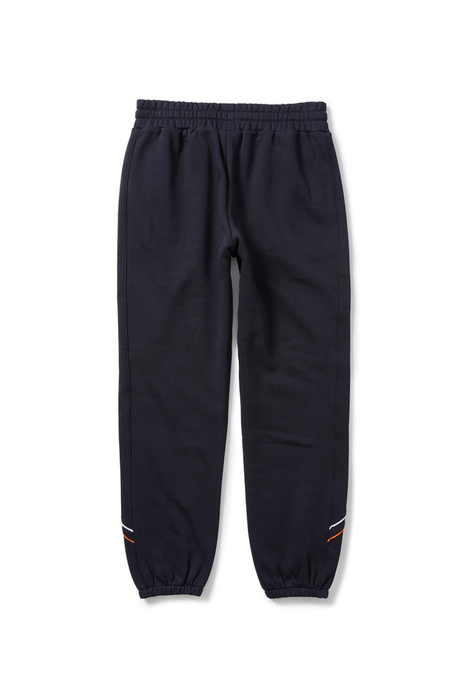 Front view of the 2025 Cotton On S10 Women's Track Pants for Carlton AFLW support.
