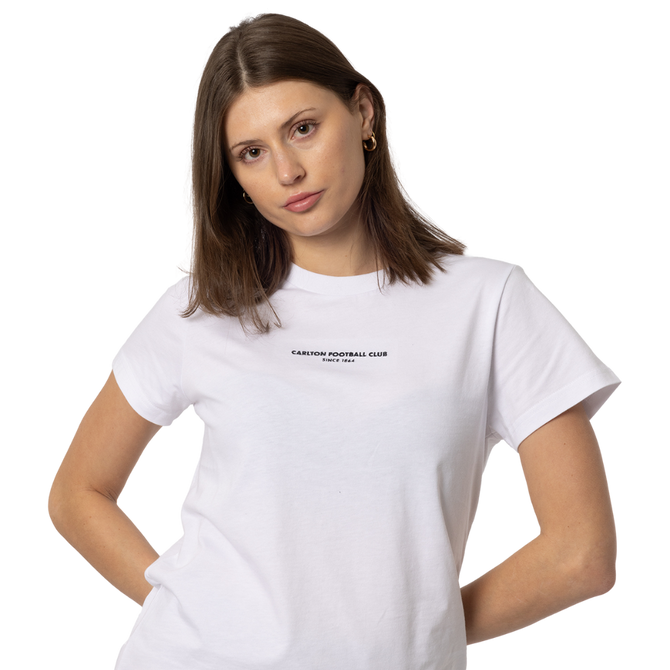 Close-up of the Carlton logo on the white Women's Signature Tee.