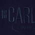 Close-up of the embossed detail on the Carlton 1864 Women's Navy Tee.