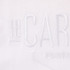 Close-up of the embossed detail on the Carlton 1864 Men's White Tee.