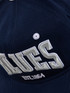 Front view of the S24 Carlton Blues Snapback cap by NAR.