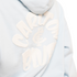 Close-up of the puff print logo on the Womens Powder Blue Puff Hood.