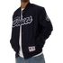 Lifestyle back shot of the '95 Nylon Bomber Jacket worn by a model.