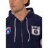 Close-up of the back logo on the Men's Throwback Logo Spray Jacket.