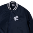 Close-up of the monogram pattern detail on the Carlton Women's Bomber Jacket.