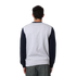 Side view of the Carlton Adults Varsity Oversized Crew sweatshirt worn by a model.