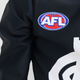 Close-up of the logo detail on the Carlton Rash Top.
