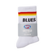 A pair of official Carlton AFLW Pride Socks by Cotton On.
