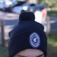 Side view of the 2025 Carlton New Era Indigenous Knit beanie.