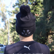 Back view of the 2025 Carlton New Era Indigenous Knit beanie.